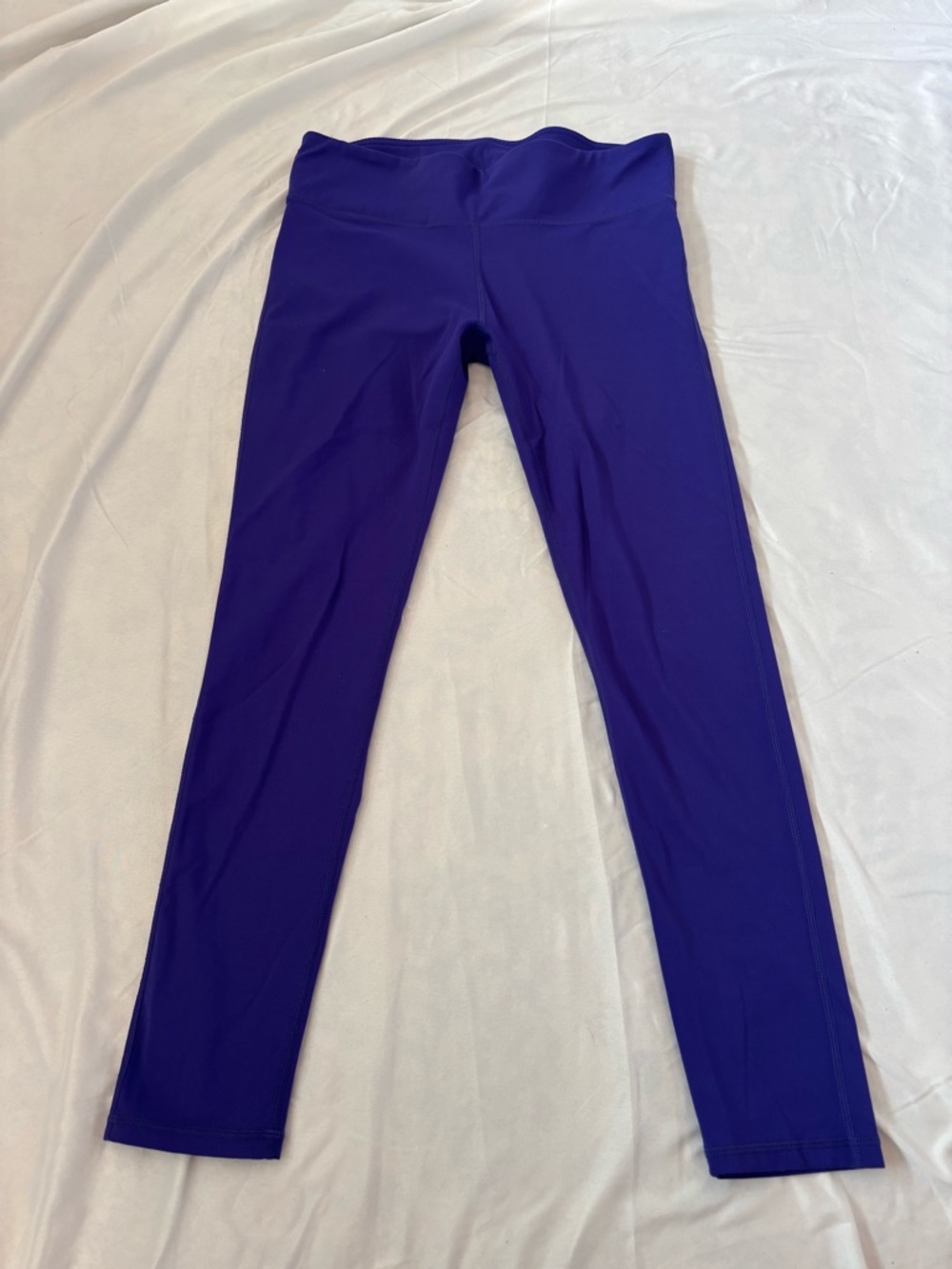 Purple leggings by Fabletics